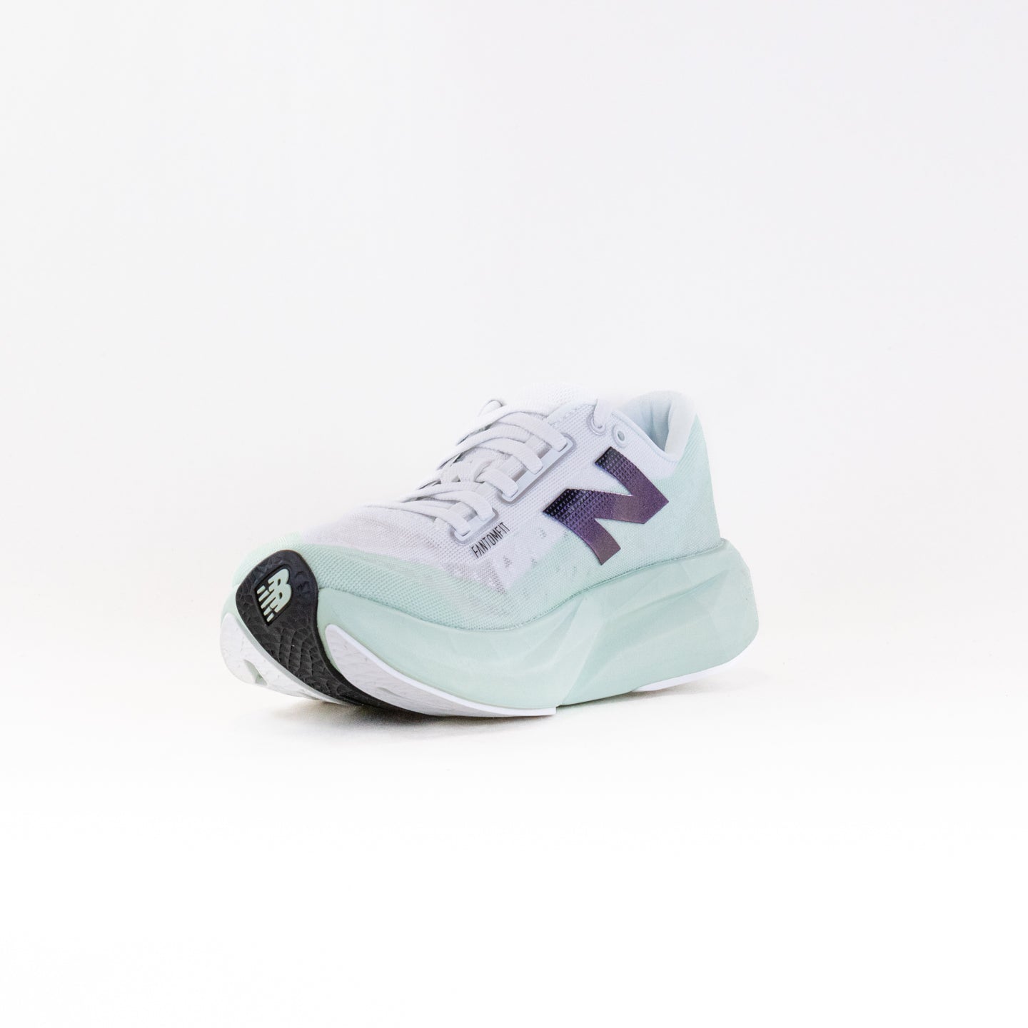 New Balance Women's FuelCell Rebel v4 Running Shoes in Green and White Color Scheme