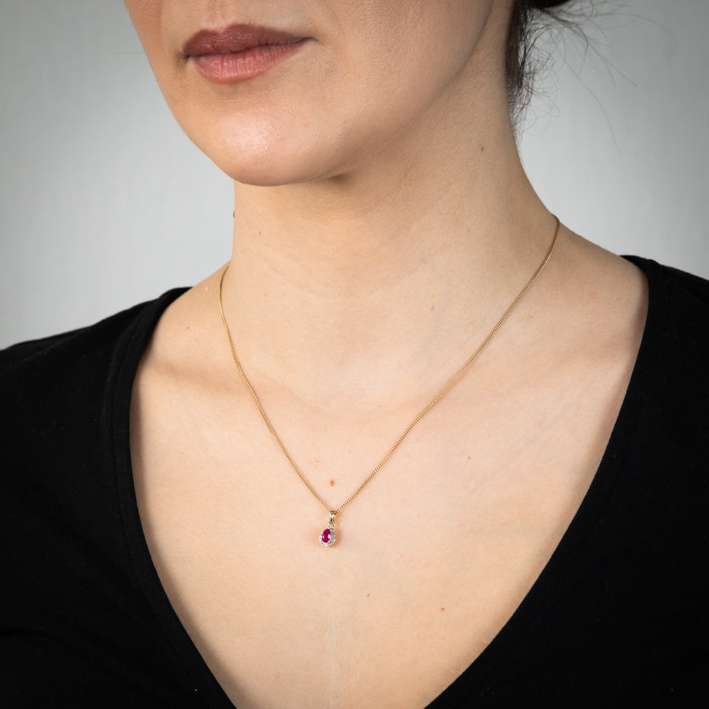 Exquisite 9ct Yellow Gold Pendant Featuring Diamonds and Created Pear-Shaped Rubies