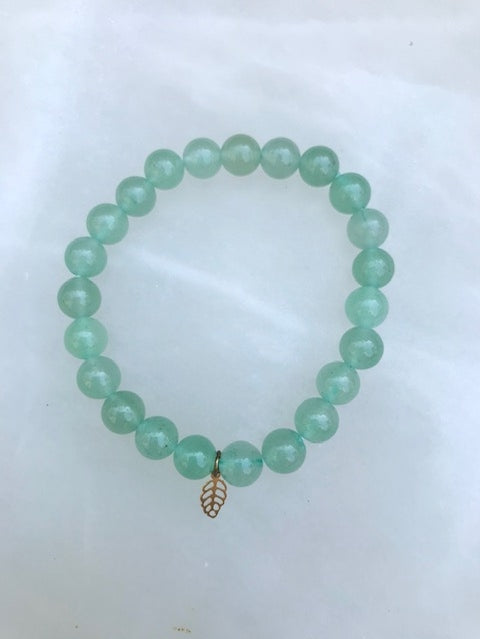 Santore Jewelry's 8mm Green Adventurine Stretch Mala Bracelet with Brass Leaf Charm