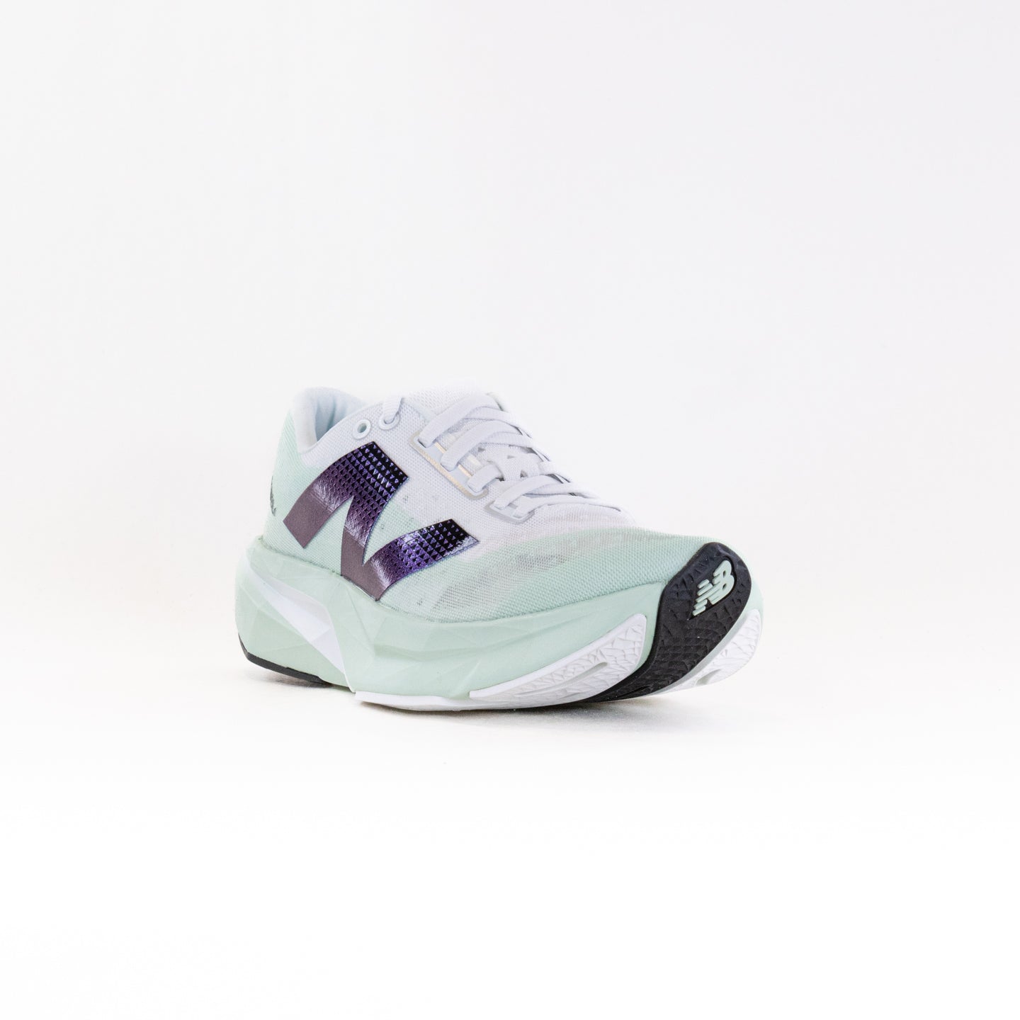 New Balance Women's FuelCell Rebel v4 Running Shoes in Green and White Color Scheme