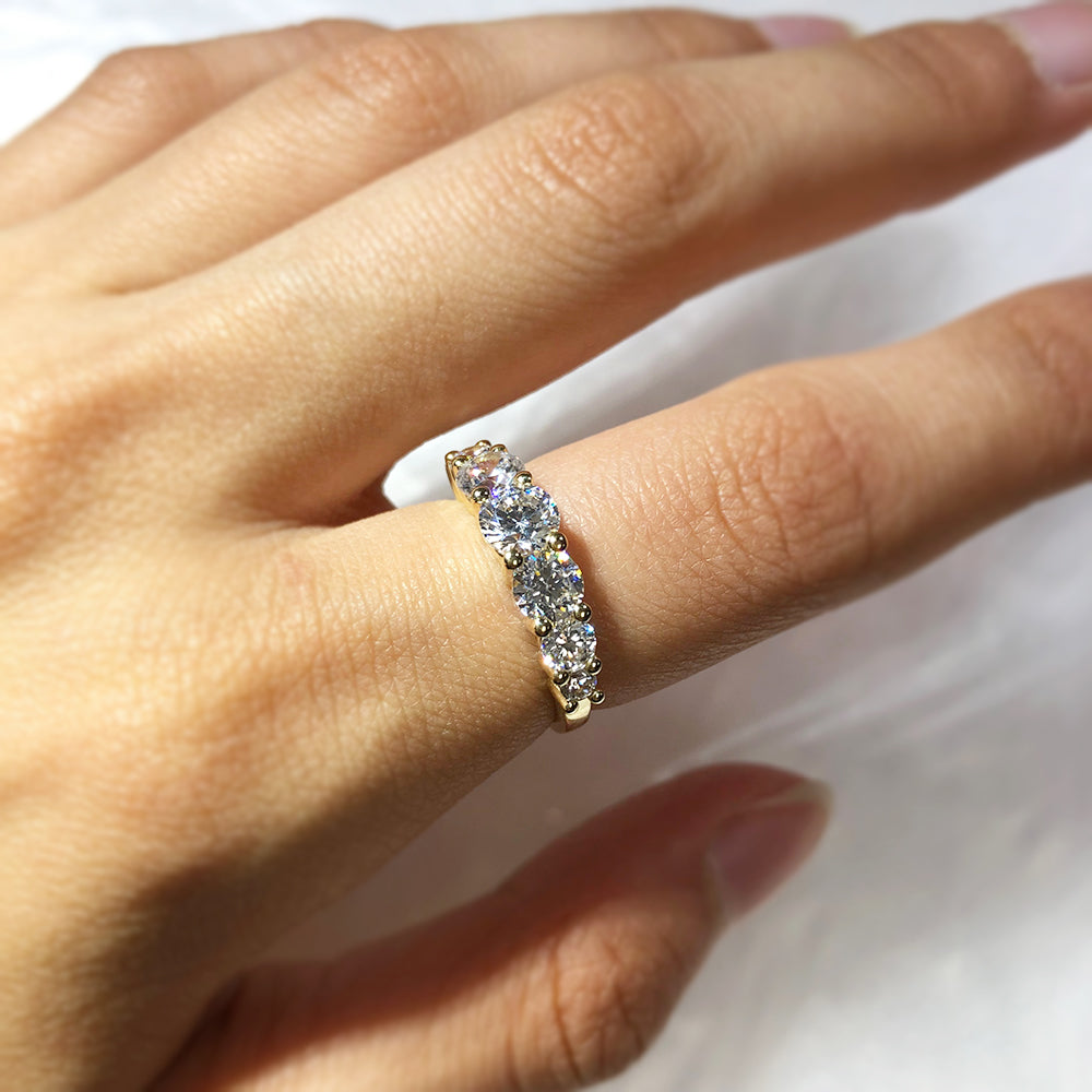 Stunning 9 Carat Yellow Gold Ring with Graduated 7 Cubic Zirconia Stones
