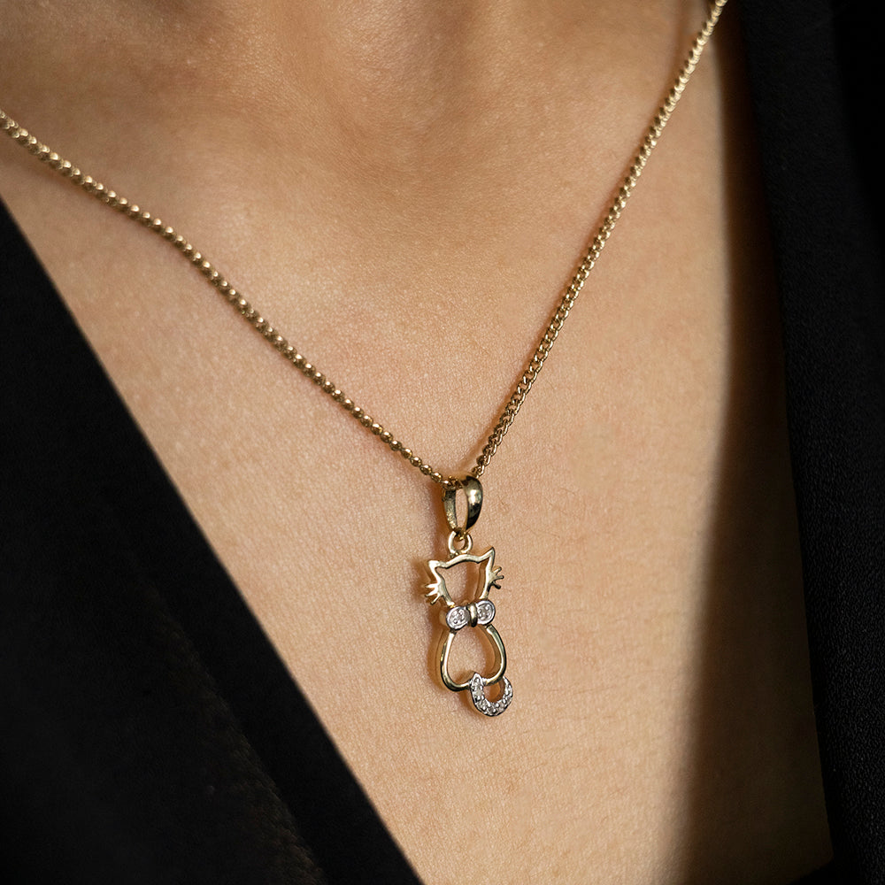 9ct Yellow Gold Diamond Cat Pendant Jewelry Piece Adorned with 7 Exquisite Brilliant Cut Diamonds