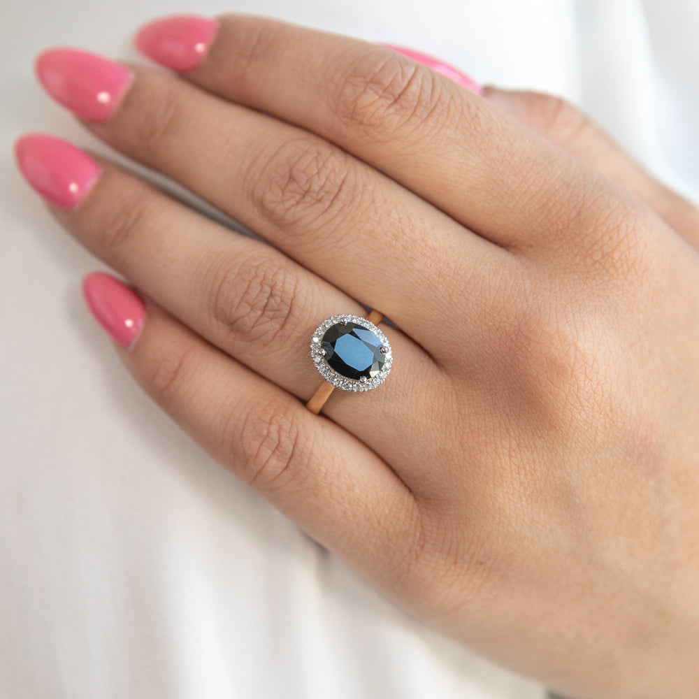 Exquisite 9 Carat Yellow Gold Ring Adorned with 3.75 Carat Natural Black Sapphire and 0.25 Carat Diamonds