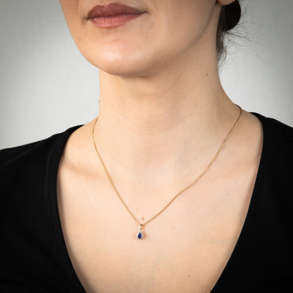 Exquisite 9ct Yellow Gold Pendant Featuring Diamonds And Lab - Created Pear - Shaped Sapphires
